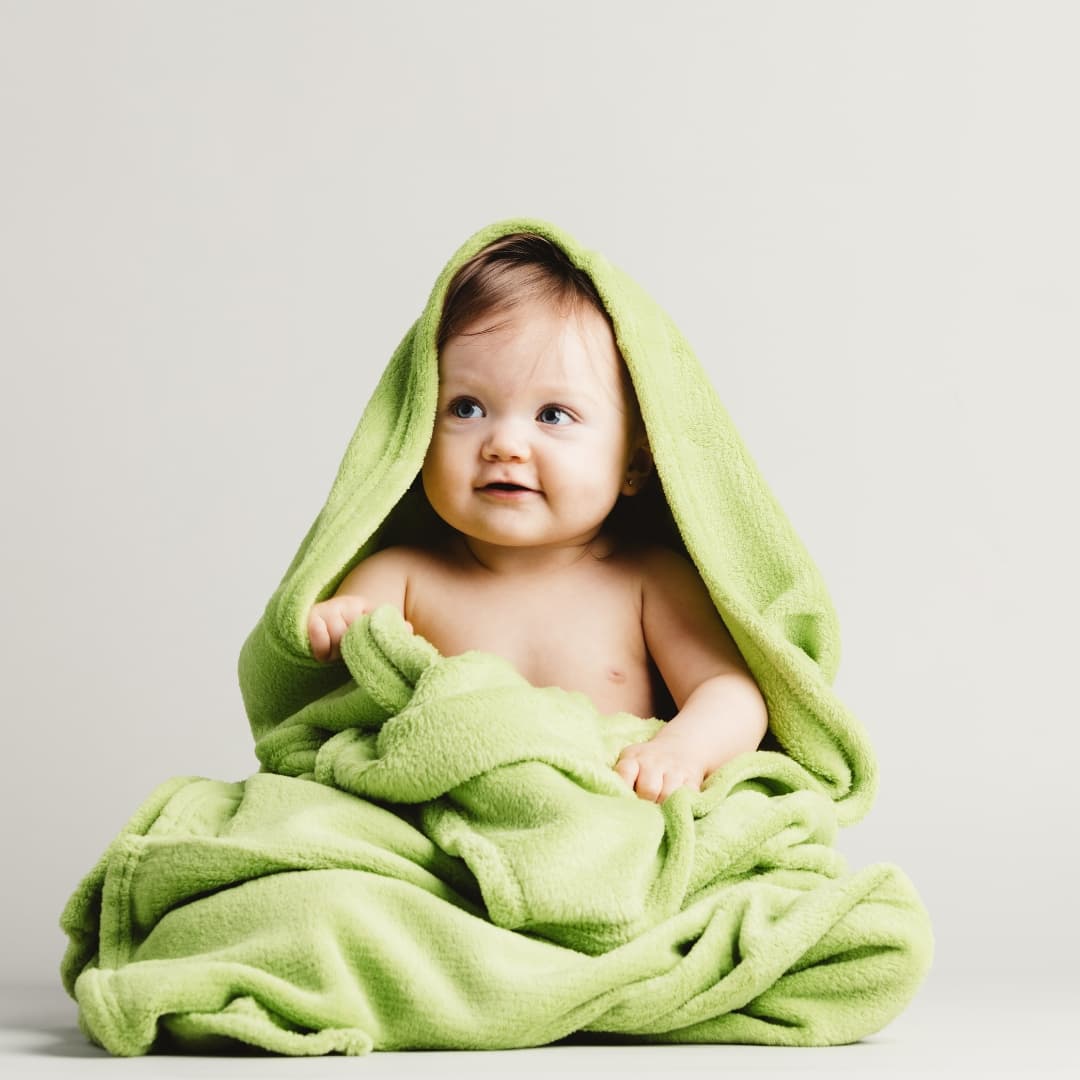 cute baby girl with blanket